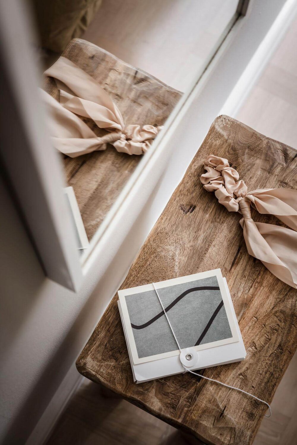 A Tiny and Stylish Nordic Apartment 20 bedroom-wooden-stool-mirror-nordroom