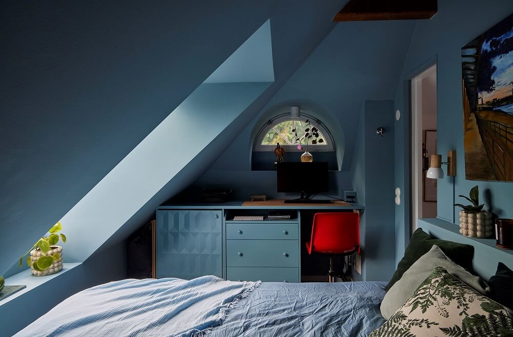 A Split-Level Attic Apartment with Blue Bedroom 15 blue-attic-bedroom-home-office-sloped-ceiling-nordroom