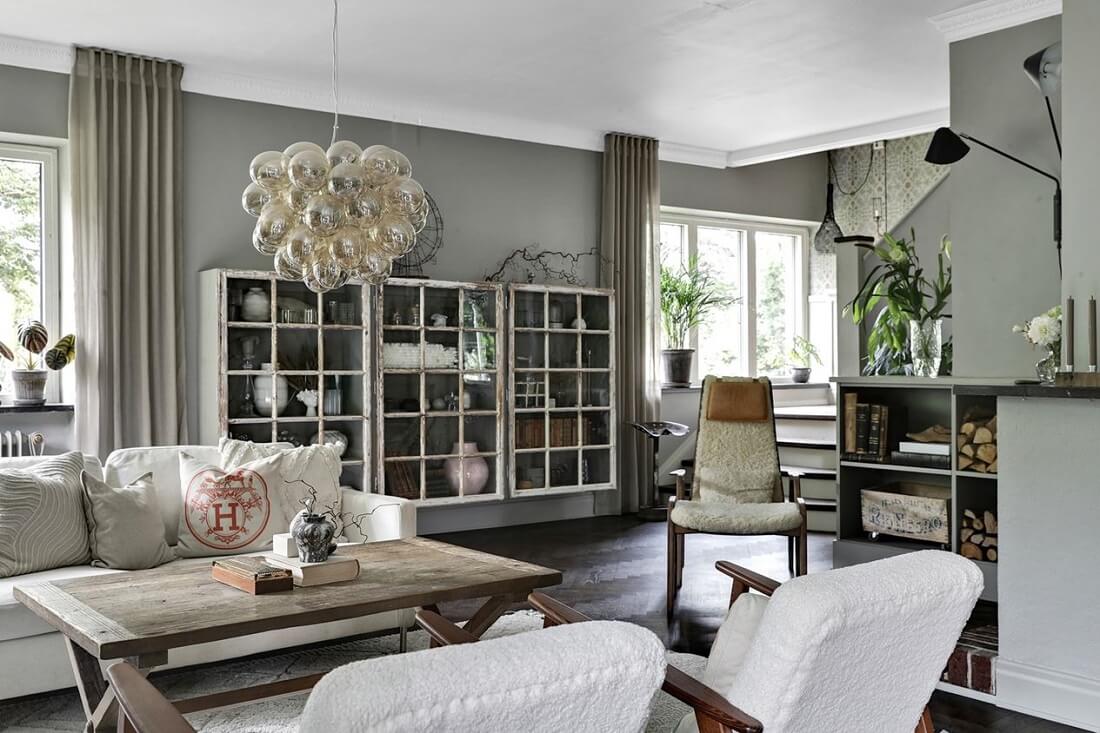 A Swedish 1930s Villa Decorated in Gray and Green Tones 2 cozy-sitting-room-gray-walls-swedish-villa-nordroom