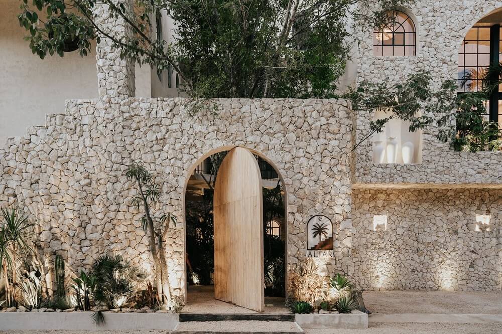 A Serene Apartment in Tulum with High Ceilings and Rooftop Pool 39 exterior-doorway-stone-wall-airbnb-mexico-nordroom