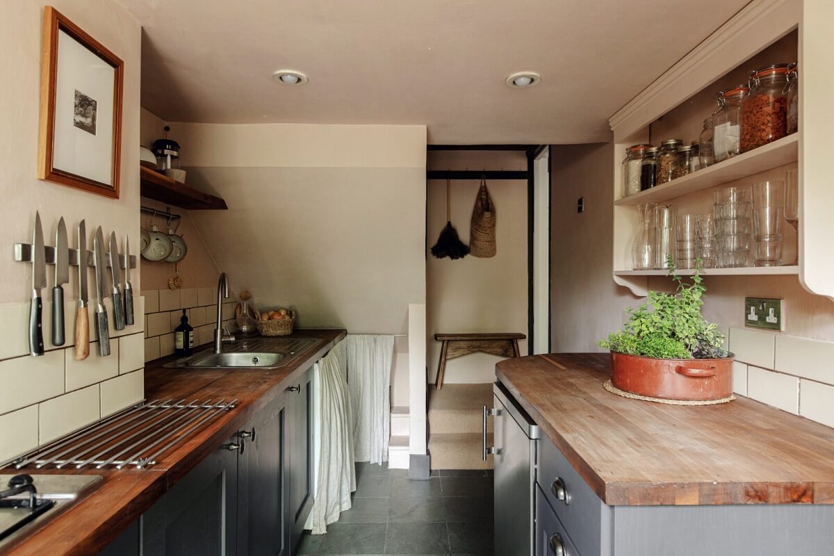 A Serene Period Home in London with Garden 3 galley-kitchen-dark-gray-cabinets-period-home-london-nordroom