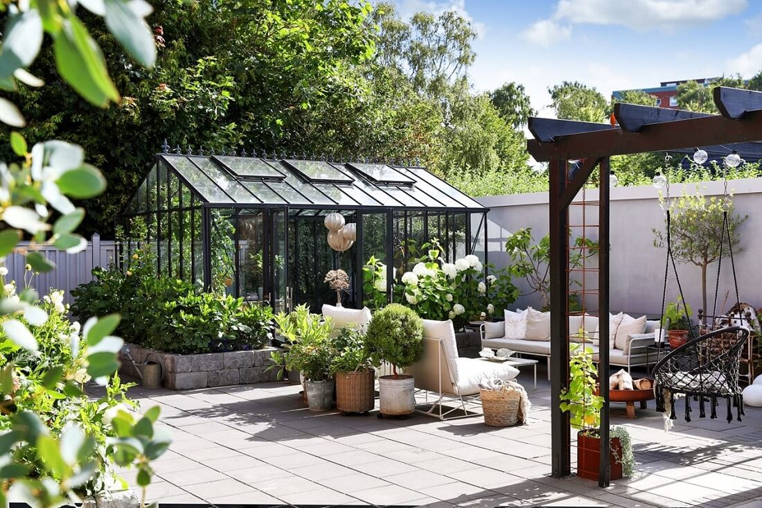 A Swedish 1930s Villa Decorated in Gray and Green Tones 24 garden-greenhouse-nordroom