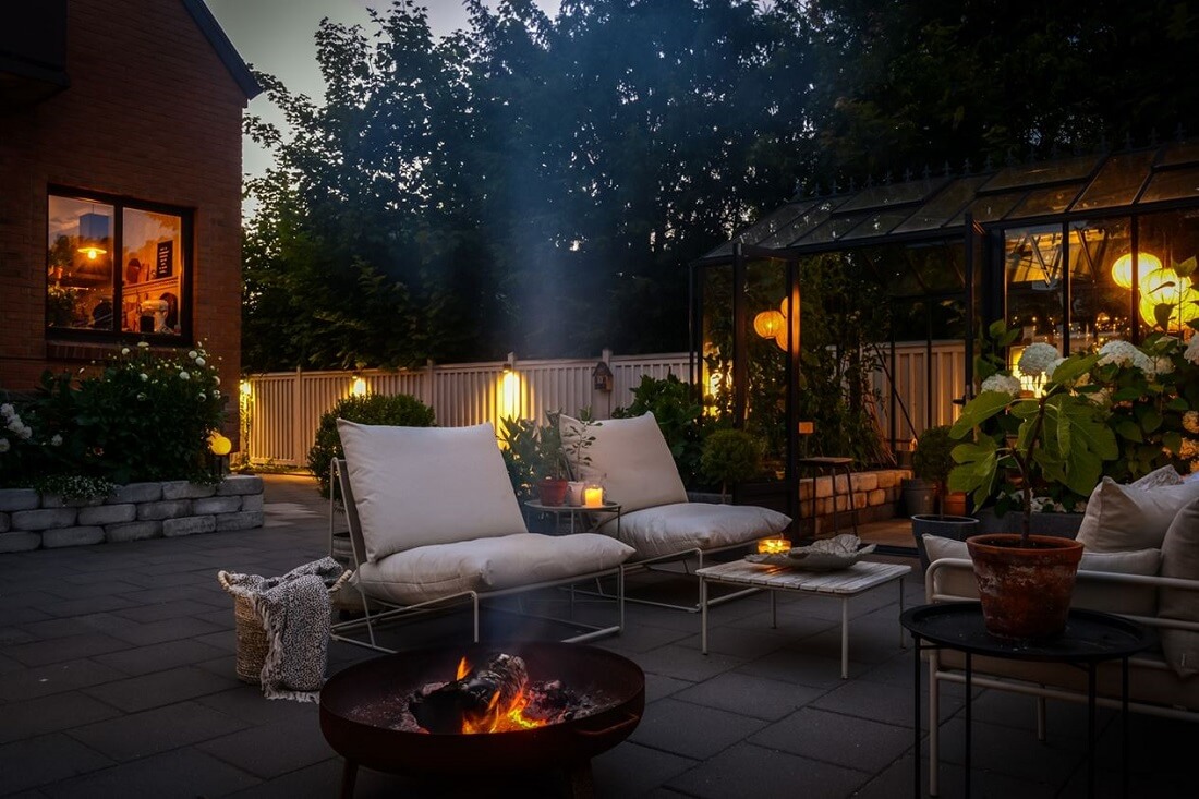 A Swedish 1930s Villa Decorated in Gray and Green Tones 28 garden-seating-fire-pit-nordroom