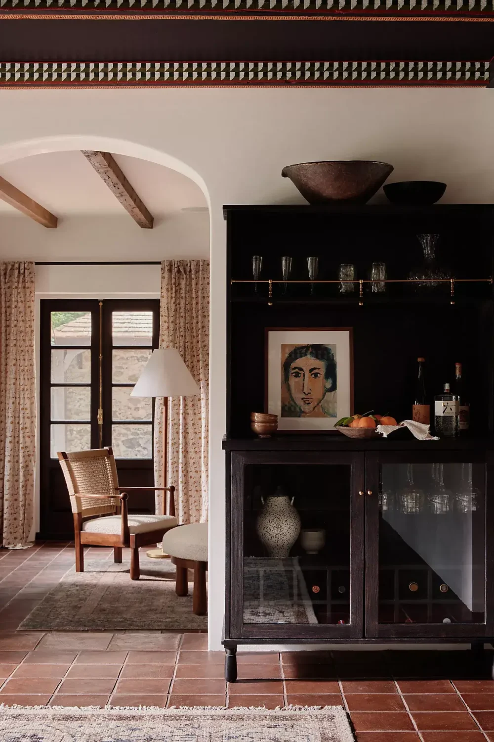 A Warm Fall Home by Amber Lewis for Anthropologie 5 glass-cabinet-terracotta-floor-tiles-fall-home-nordroom