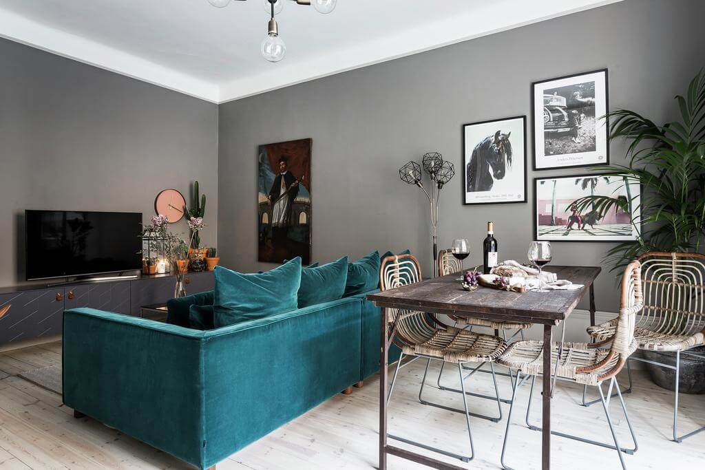 Glidden & PPG Color of the Year 2023: Vining Ivy 21 gray living room with teal sofa Glidden & PPG Color of the Year 2023: Vining Ivy