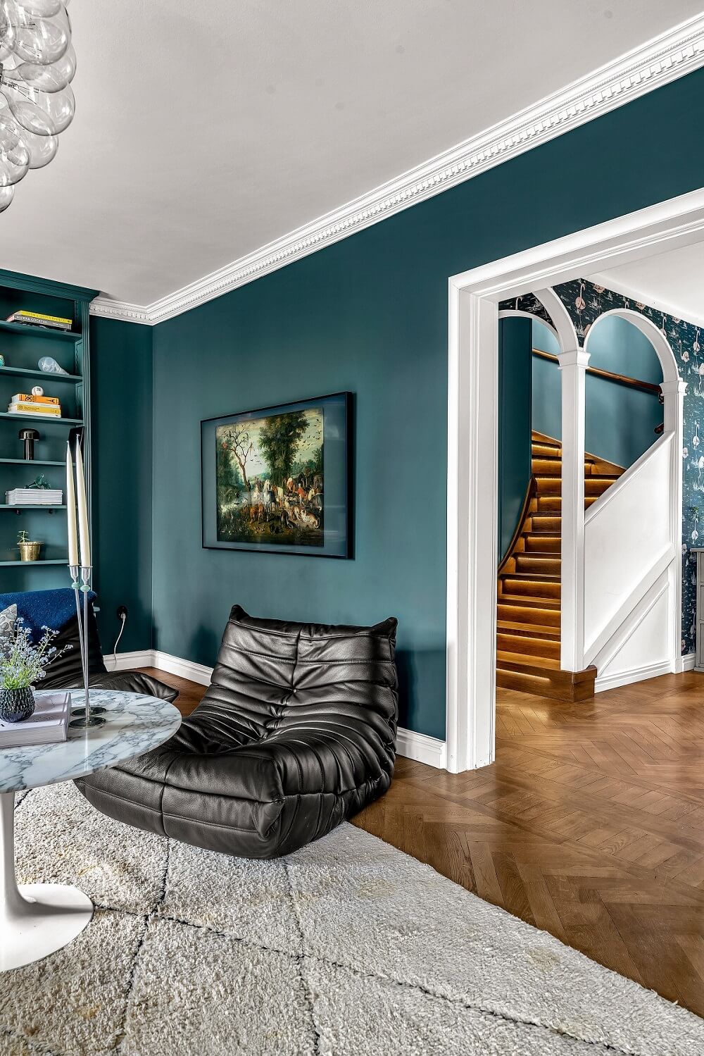 Bold Colors in a 1920s Villa in Sweden 2 green-sitting-room-black-togo-chair-nordroom