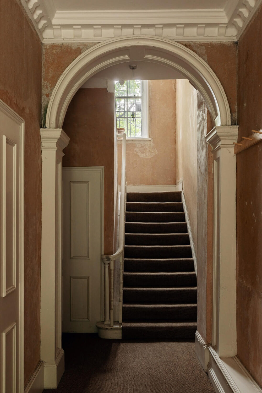 A Serene Period Home in London with Garden 21 hallway-arched-doorway-london-apartment-complex-georgian-architecture-nordroom