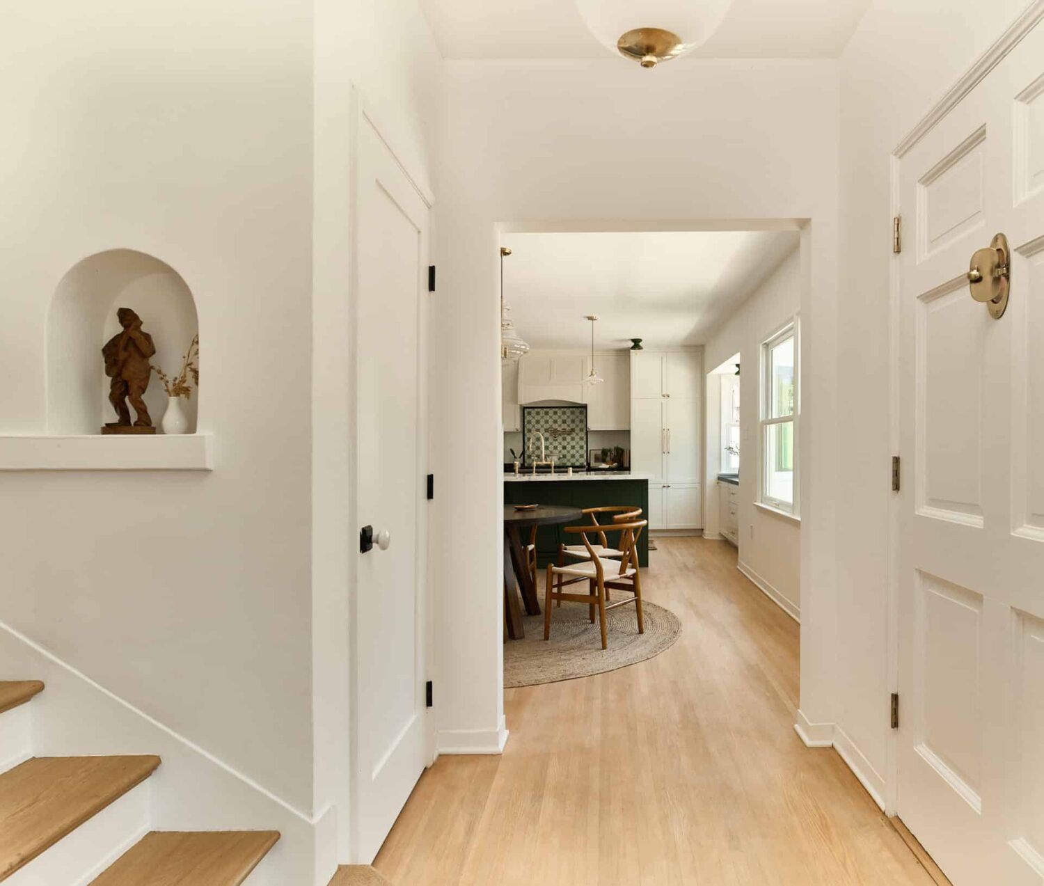Warm Neutrals in a Lovely Home in Silver Lake, Los Angeles 7 hallway-white-niche-kitchen-view-nordroom