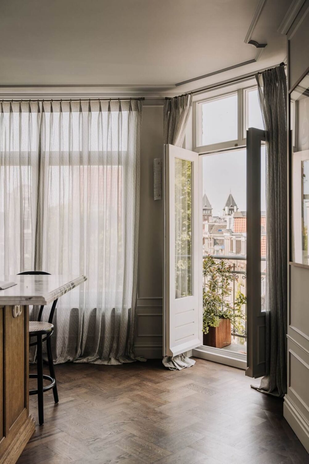 A Luxurious Canal House in Amsterdam 10 kitchen-balcony-double-doors-nordroom