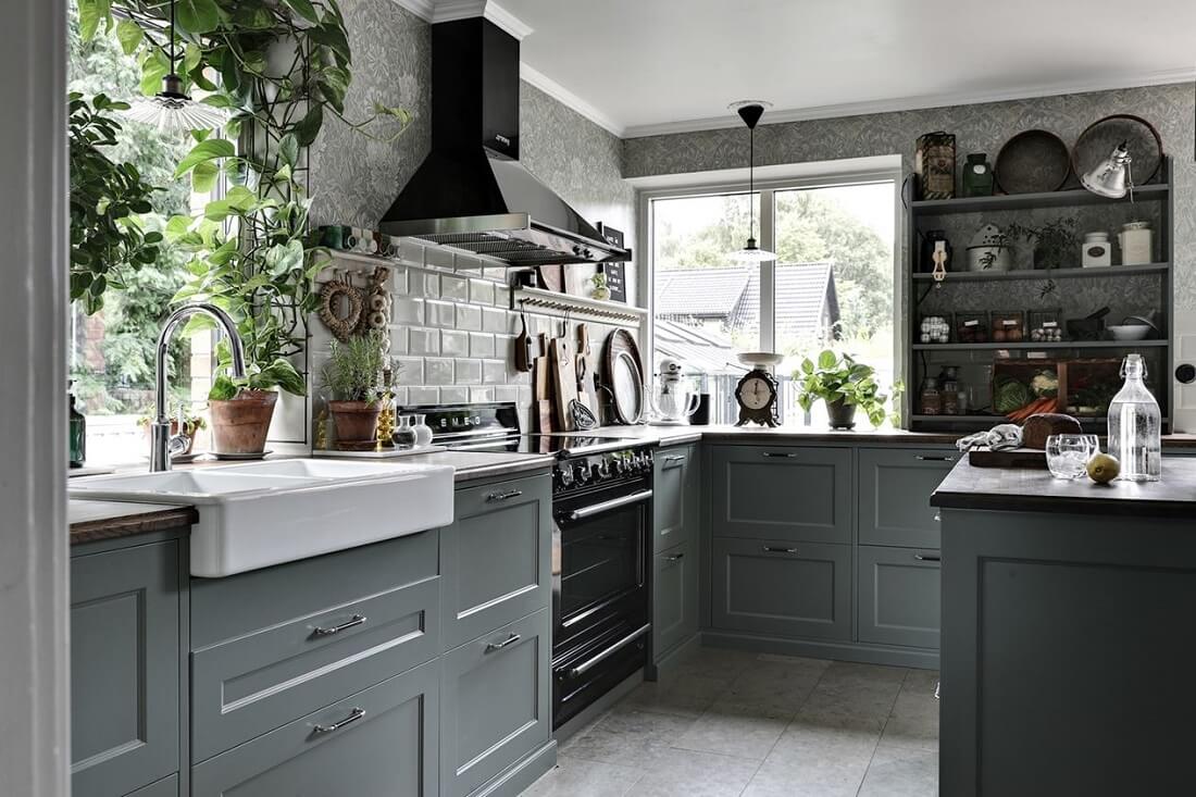 A Swedish 1930s Villa Decorated in Gray and Green Tones 6 kitchen-gray-cabinets-green-wallpaper-plants-nordroom