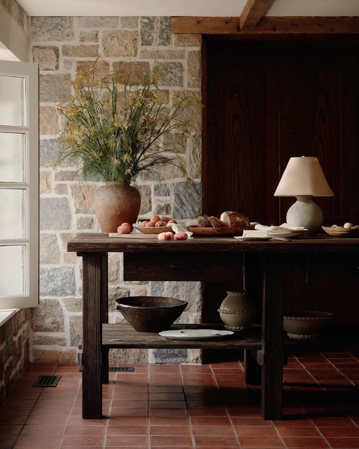 A Warm Fall Home by Amber Lewis for Anthropologie 7 kitchen-island-terracotta-floor-nordroom