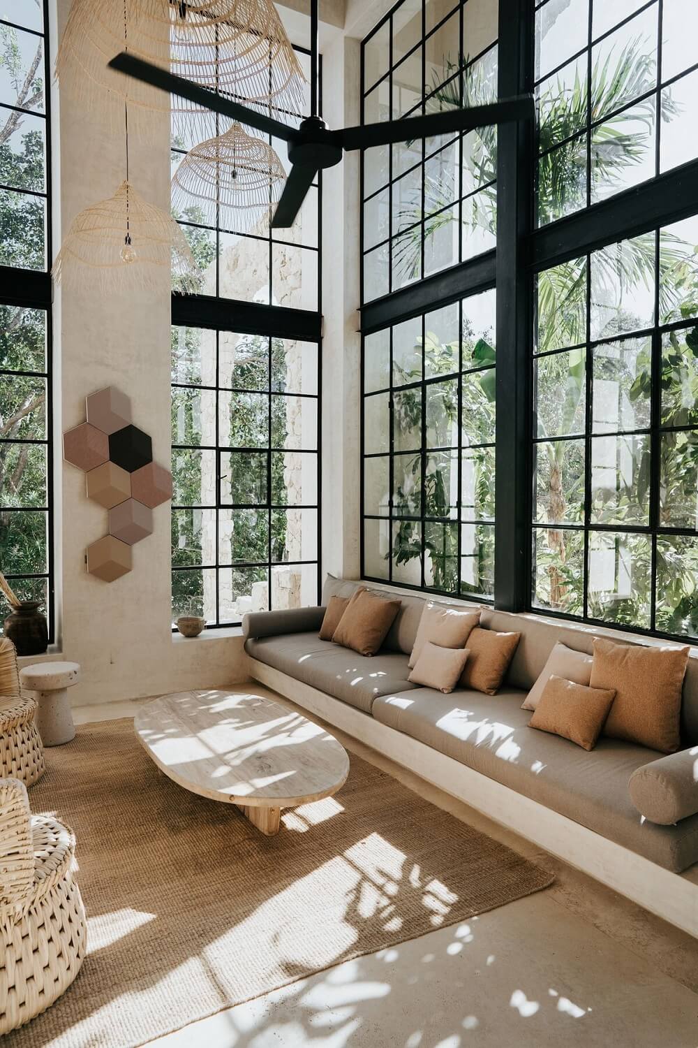 A Serene Apartment in Tulum with High Ceilings and Rooftop Pool 1 light-living-room-high-windows-natural-materials-nordroom