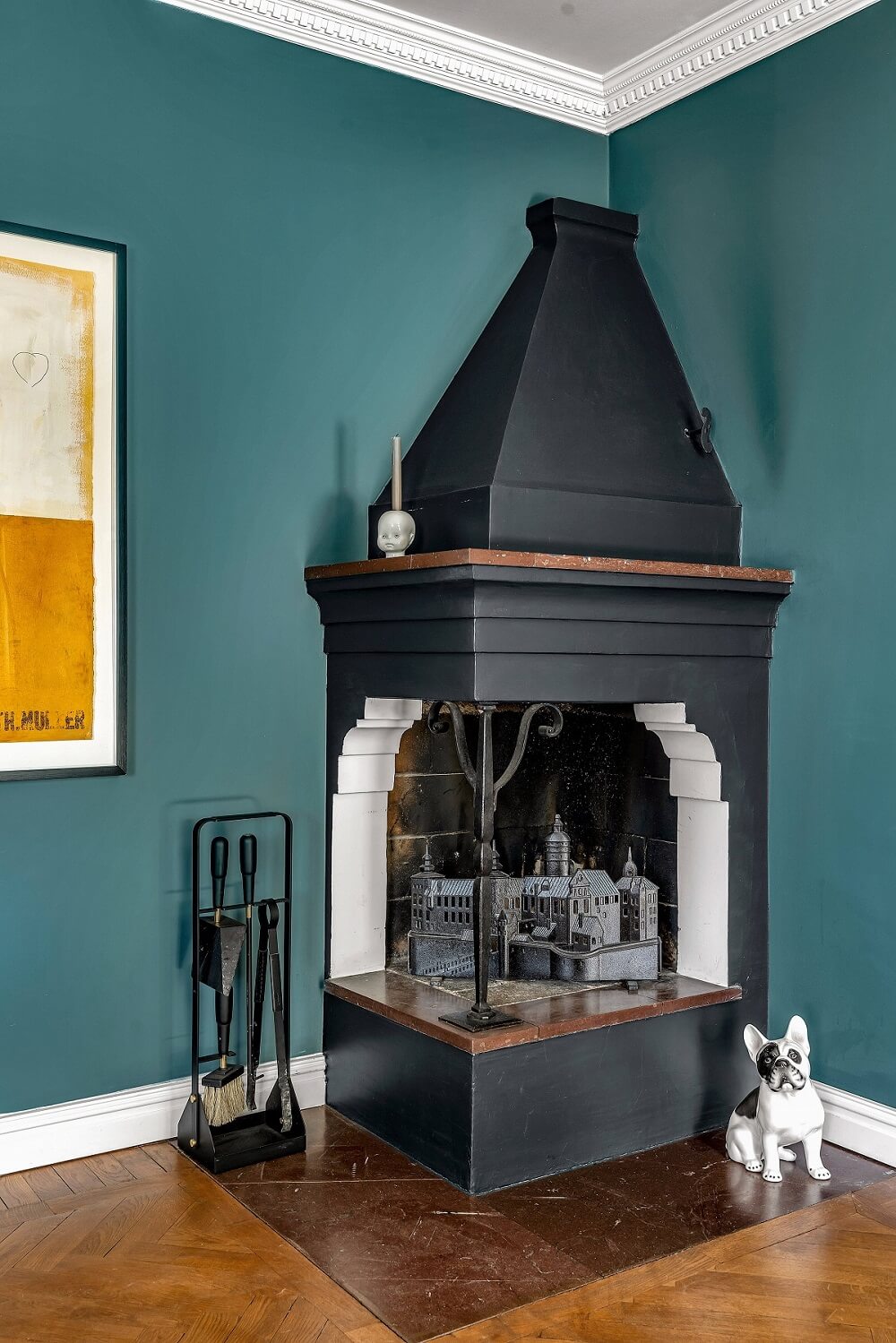 Bold Colors in a 1920s Villa in Sweden 4 living-room-black-fireplace-teal-walls-nordroom