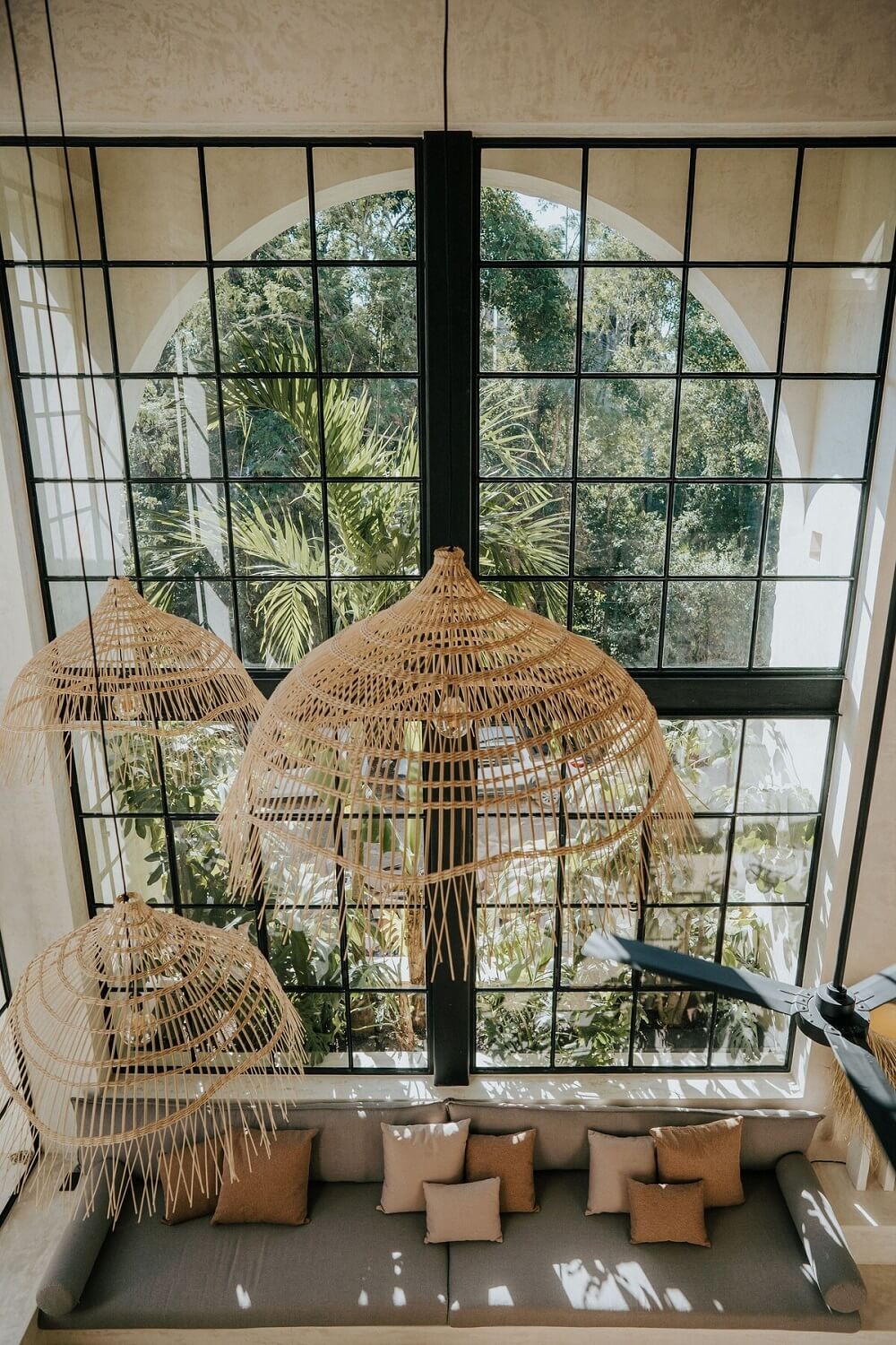 A Serene Apartment in Tulum with High Ceilings and Rooftop Pool 9 living-room-double-height-ceiling-natural-materials-pendant-nordroom