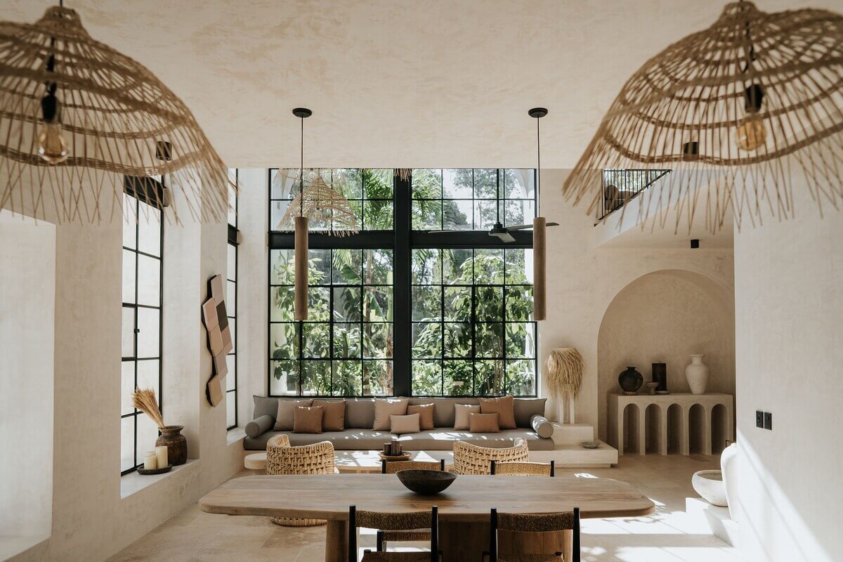 A Serene Apartment in Tulum with High Ceilings and Rooftop Pool 6 living-room-oval-dining-table-serene-interiors-nordroom