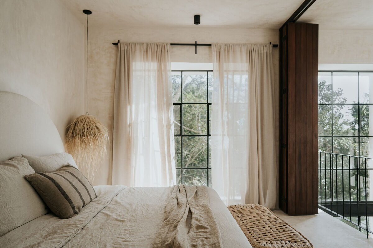 A Serene Apartment in Tulum with High Ceilings and Rooftop Pool 14 loft-bedroom-natural-materials-light-colors-nordroom