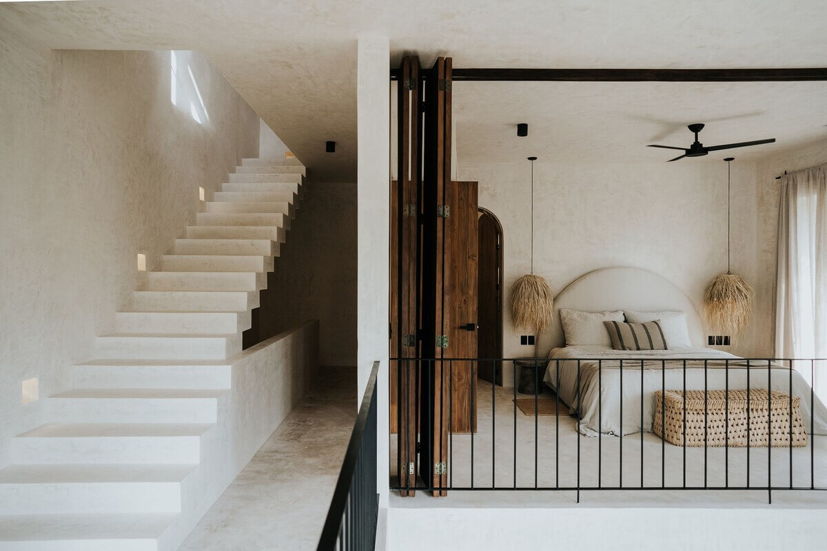 A Serene Apartment in Tulum with High Ceilings and Rooftop Pool 12 loft-bedroom-wooden-doors-nordroom