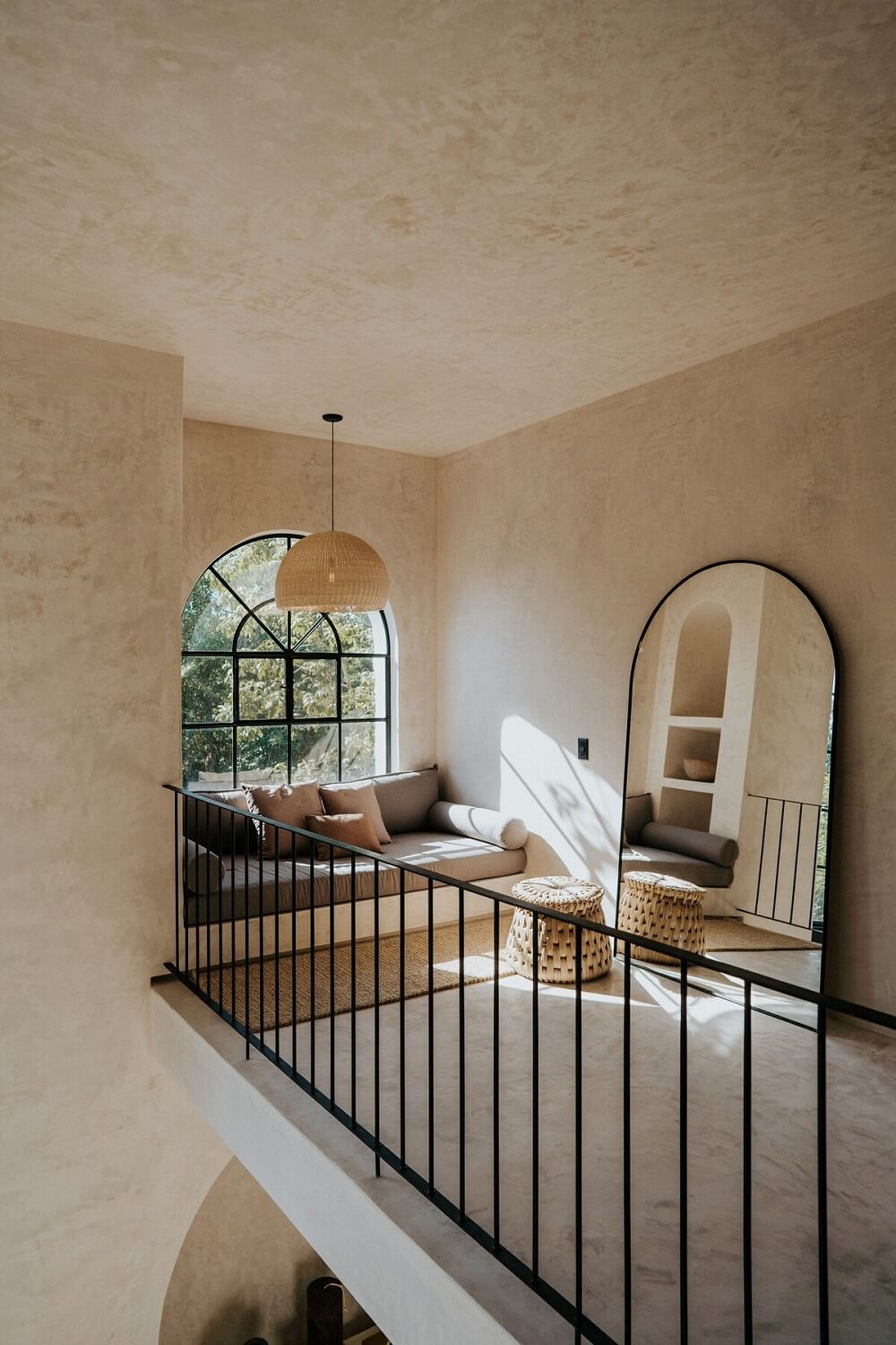 A Serene Apartment in Tulum with High Ceilings and Rooftop Pool 24 loft-space-window-seat-arched-mirror-nordroom