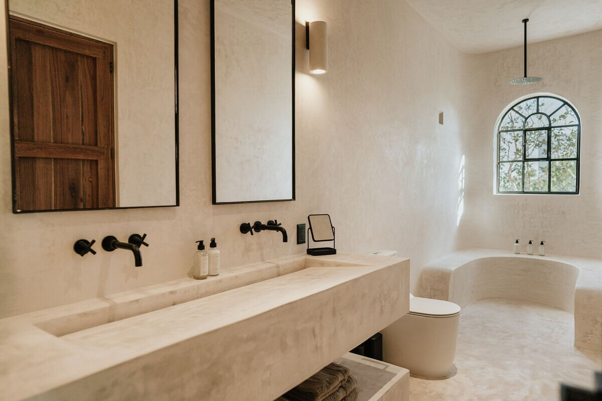 A Serene Apartment in Tulum with High Ceilings and Rooftop Pool 20 modern-bathroom-black-fittings-shower-nordroom