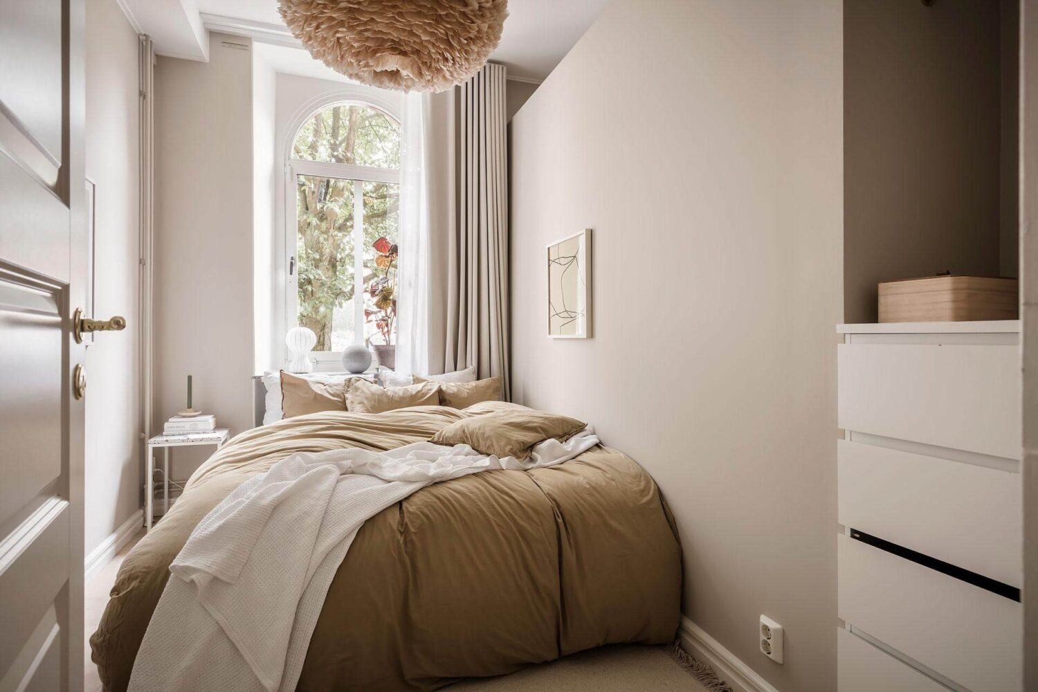 A Tiny and Stylish Nordic Apartment 14 narrow-sand-colored-bedroom-nordroom
