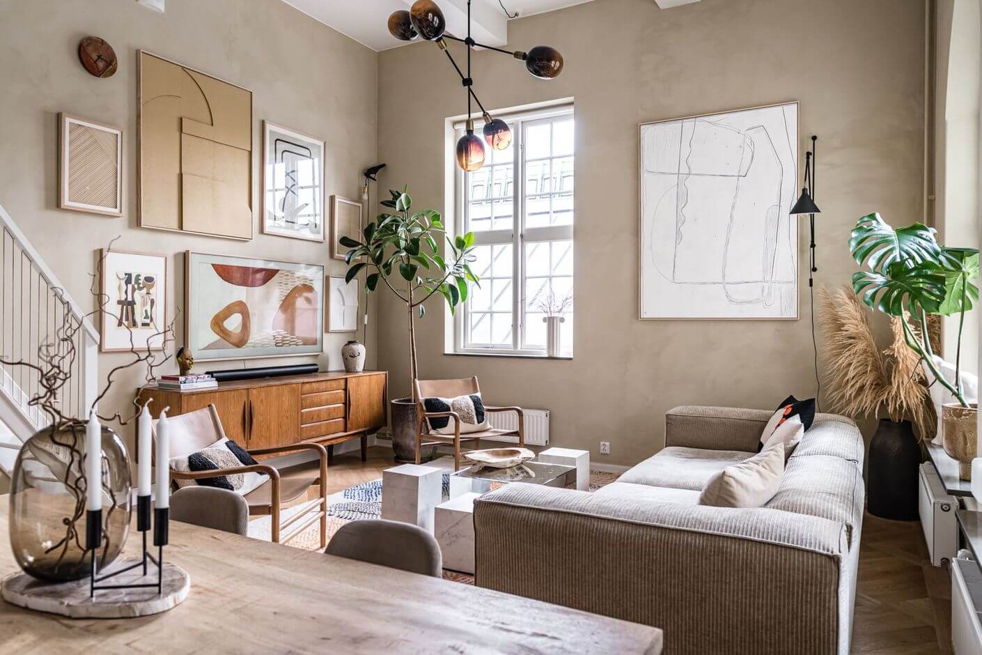 A Historic Factory Transformed Into A Stylish Home 8 nordic-living-room-gray-sofa-nordroom