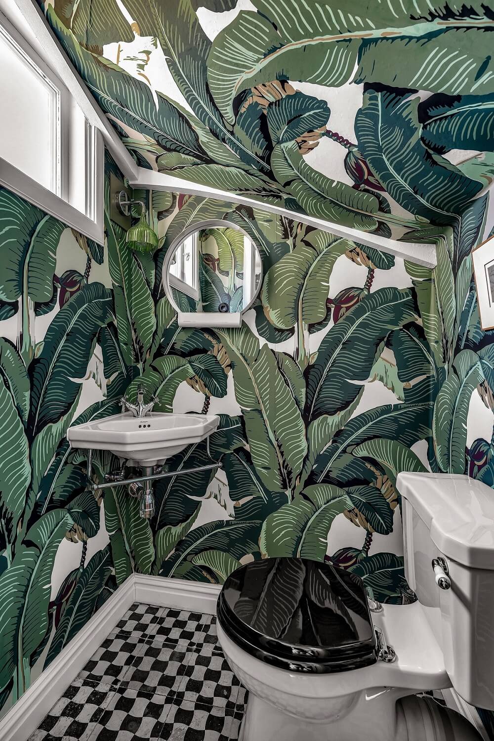 Bold Colors in a 1920s Villa in Sweden 12 powder-room-leaf-wallpaper-nordroom
