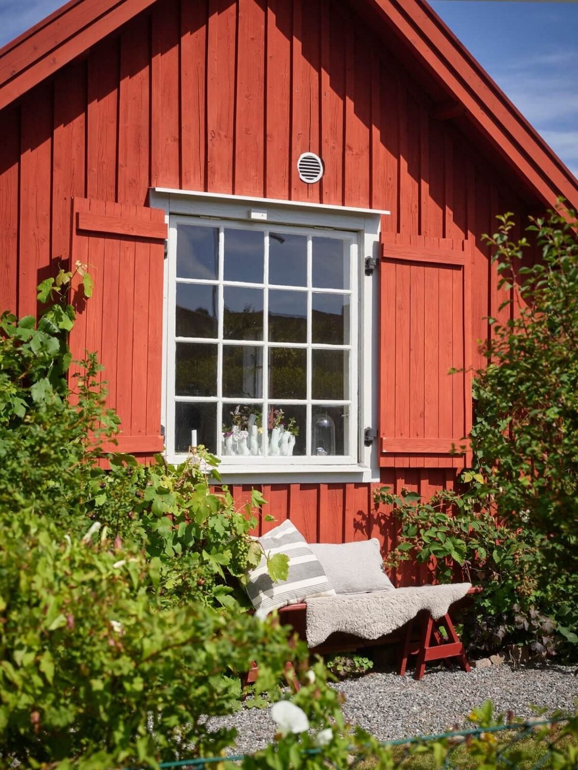 A Cozy Renovated Cottage on a Swedish Allotment 25 red-painted-cottage-shutters-nordroom
