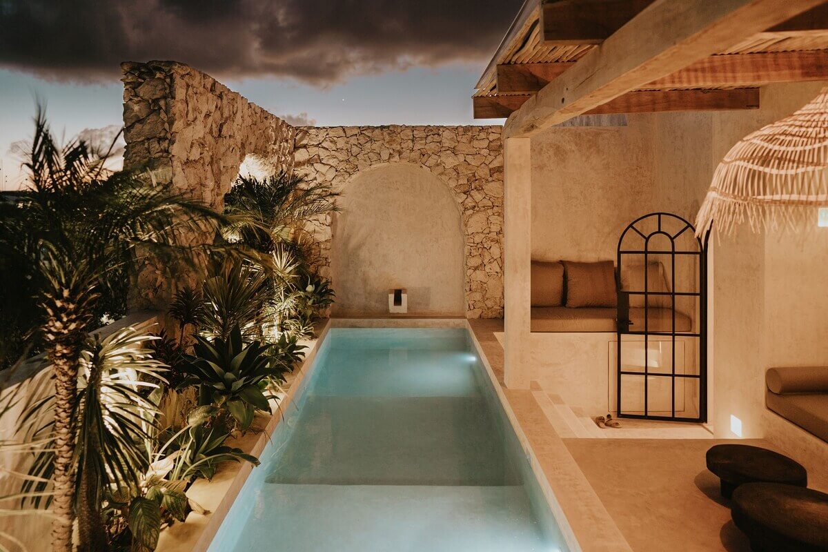 A Serene Apartment in Tulum with High Ceilings and Rooftop Pool 34 rooftop-swimming-pool-at-night-airbnb-mexico-nordroom
