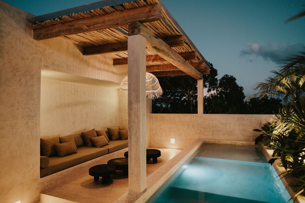 A Serene Apartment in Tulum with High Ceilings and Rooftop Pool 33 rooftop-swimming-pool-lounge-nordroom