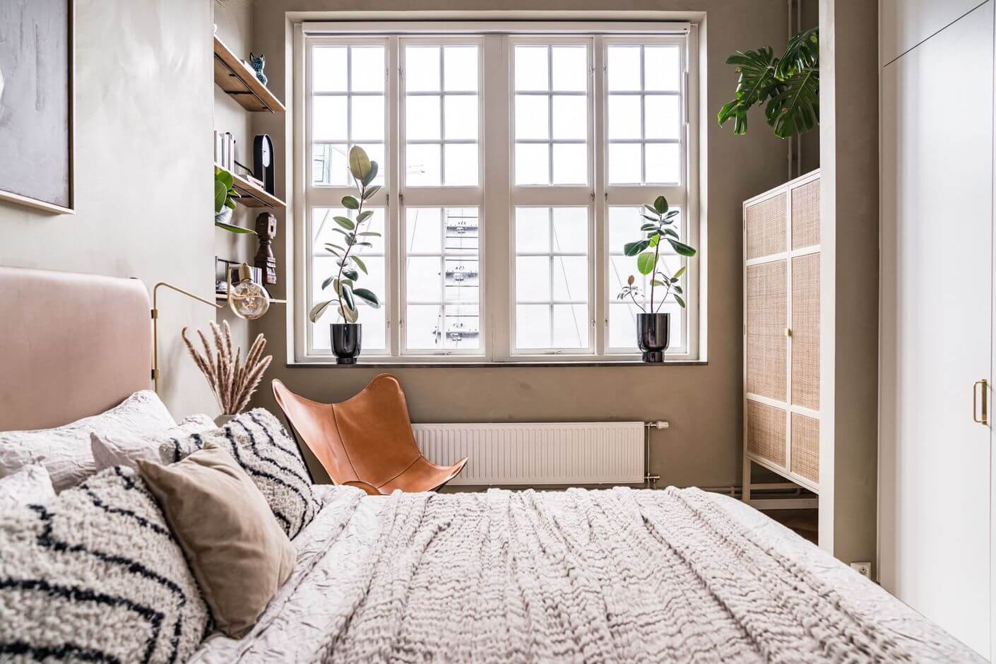 A Historic Factory Transformed Into A Stylish Home 21 scandi-bedroom-layered-textiles-nordroom