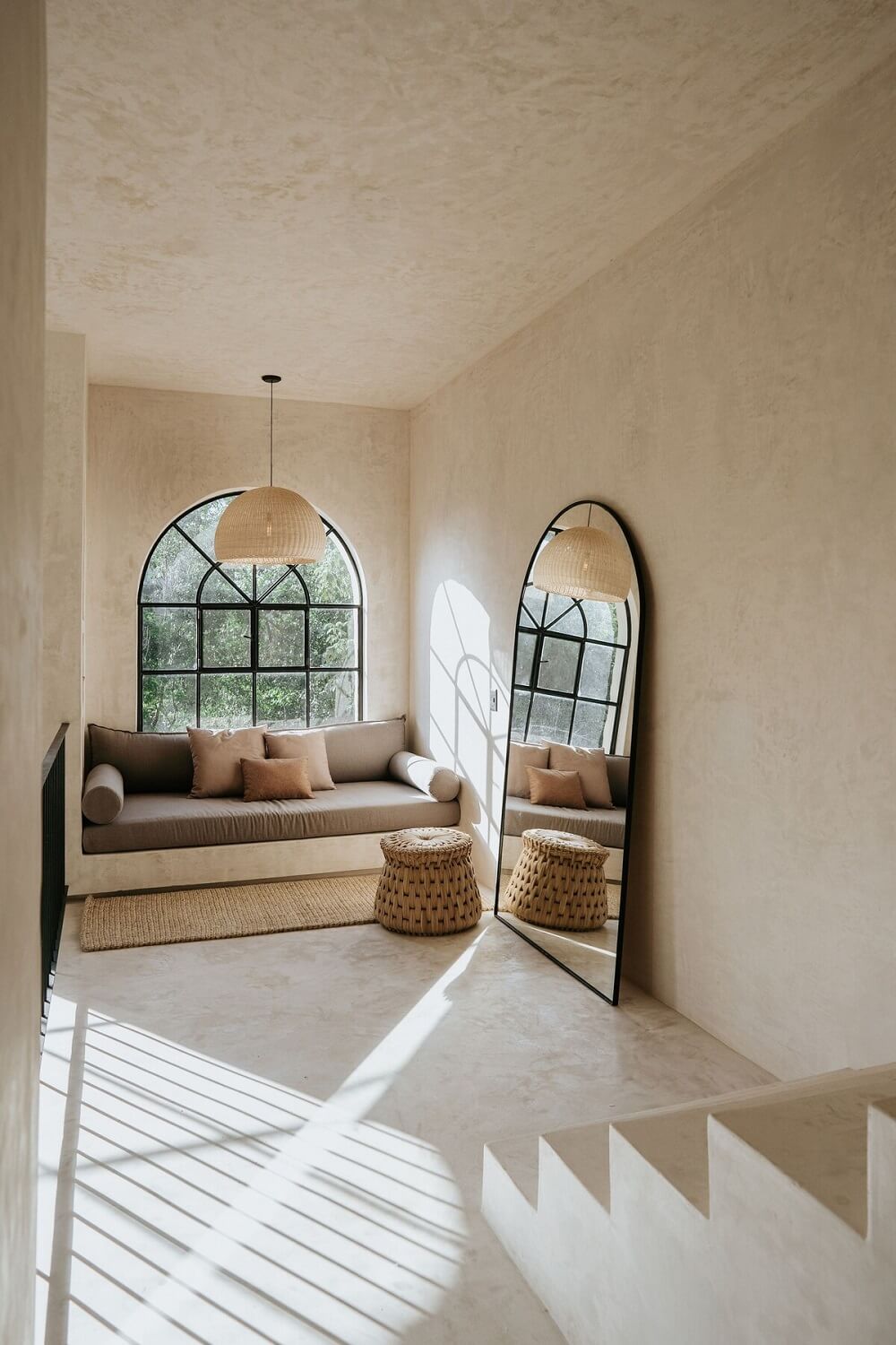 A Serene Apartment in Tulum with High Ceilings and Rooftop Pool 26 serene-window-seat-arched-window-arched-mirror-nordroom