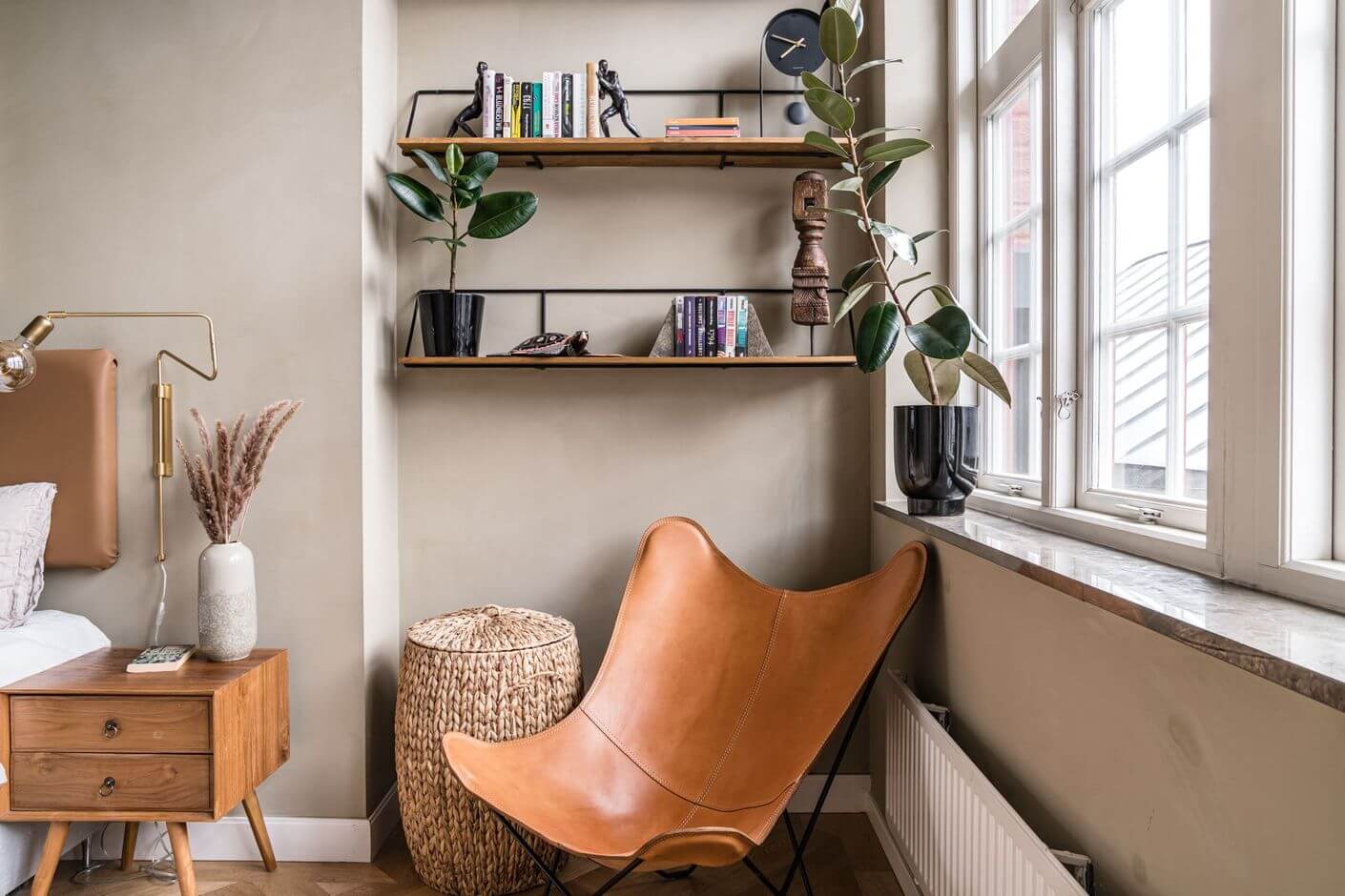 A Historic Factory Transformed Into A Stylish Home 25 shelves-leather-butterfly-chair-nordroom