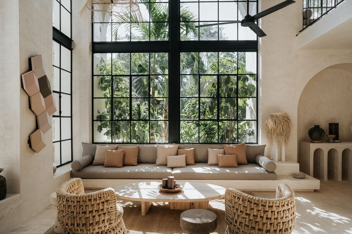 A Serene Apartment in Tulum with High Ceilings and Rooftop Pool 4 sitting-room-high-ceiling-large-windows-nordroom
