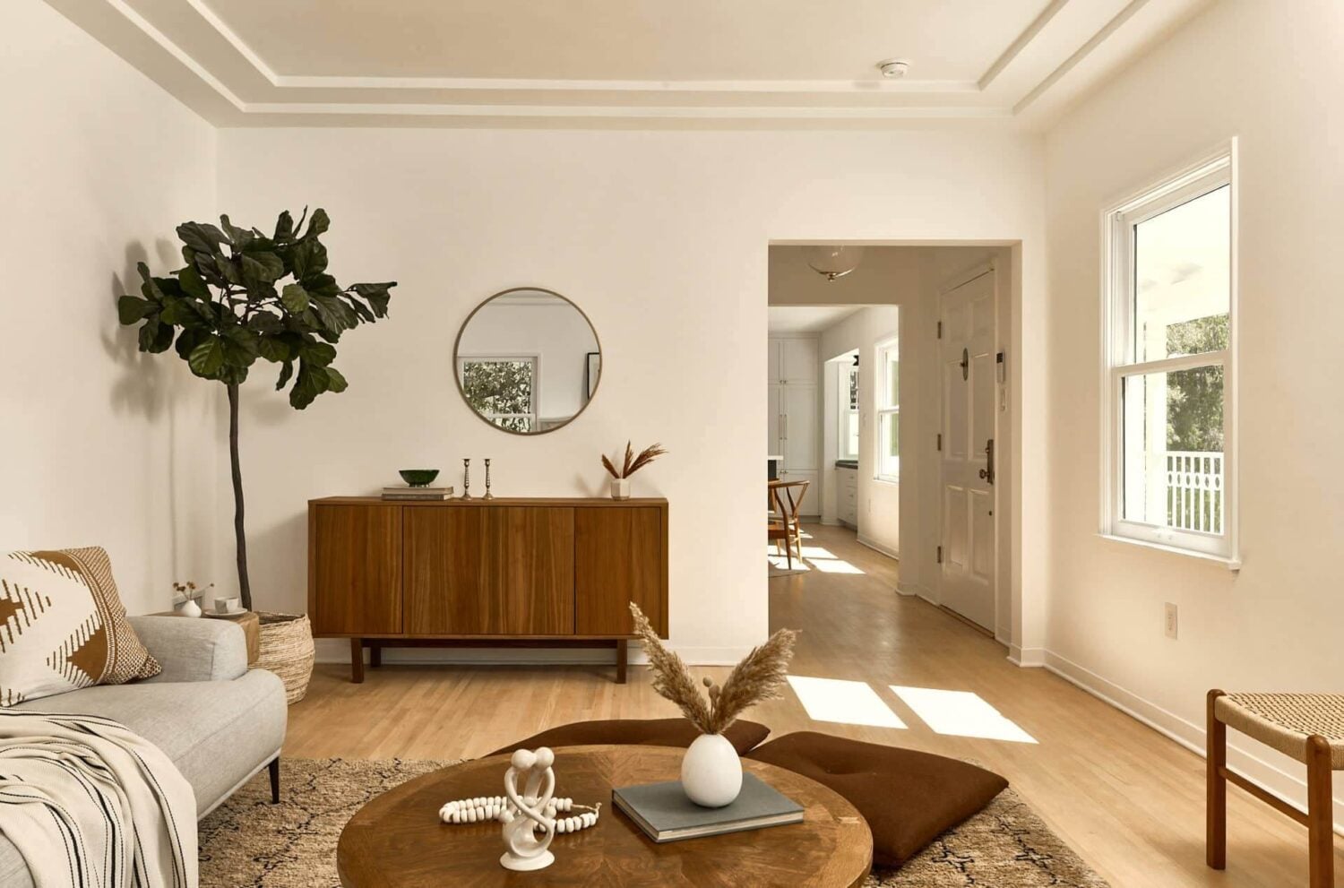 Warm Neutrals in a Lovely Home in Silver Lake, Los Angeles 6 sitting-room-warm-neutral-round-mirror-nordroom