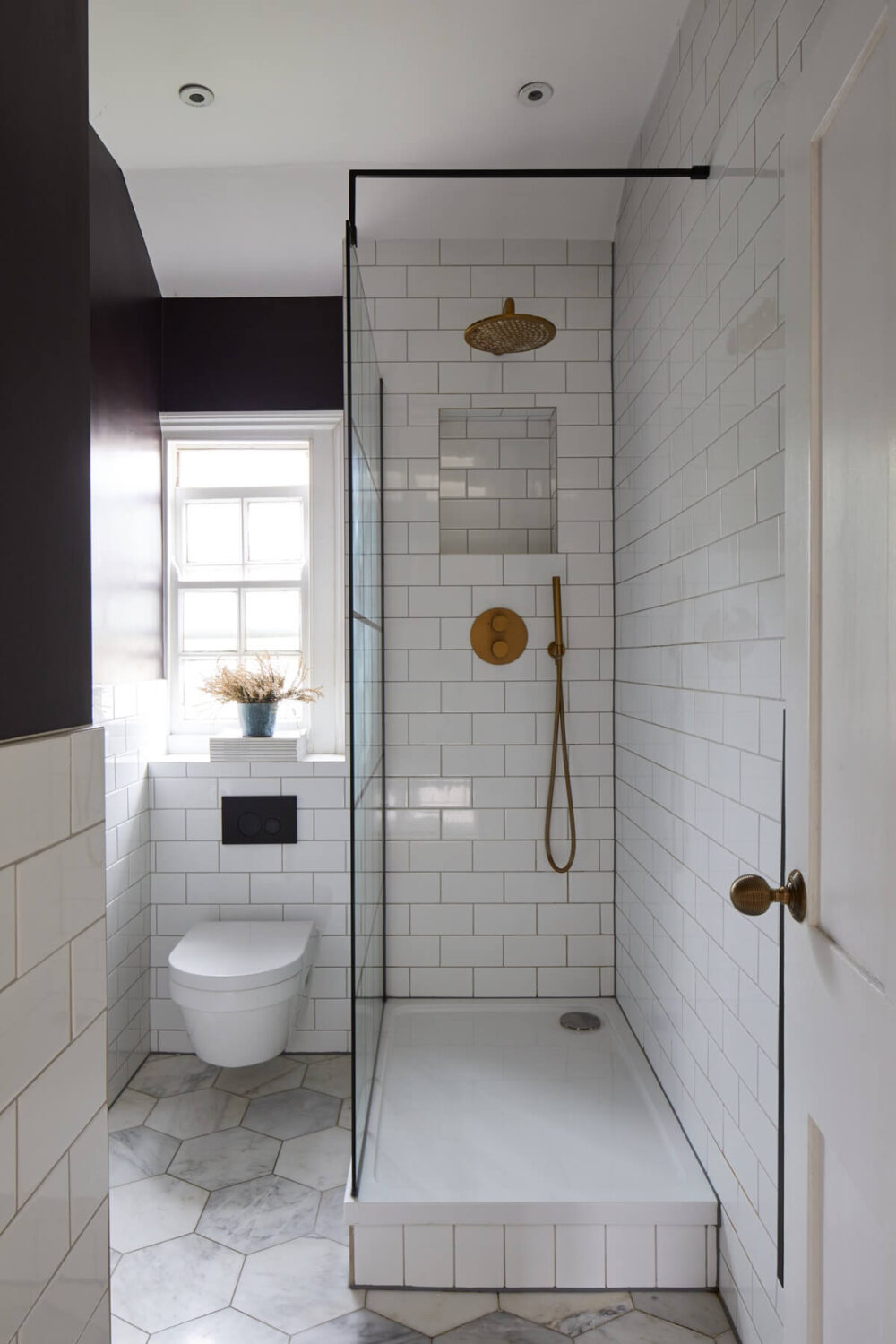 A London Apartment with Olive Green Living Room 12 small-bathroom-white-subway-tiles-hexagon-floor-tiles-black-painted-walls-nordroom
