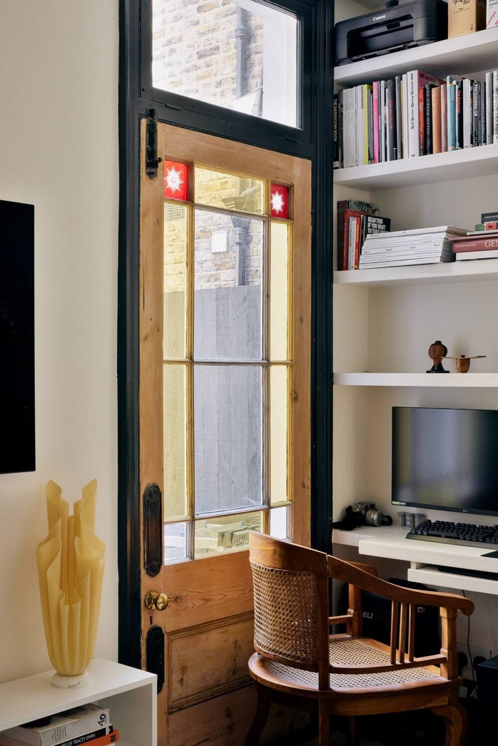 A One-Bedroom Apartment with Colorful Rooms 2 small-home-office-stained-glass-door-shelves-nordroom