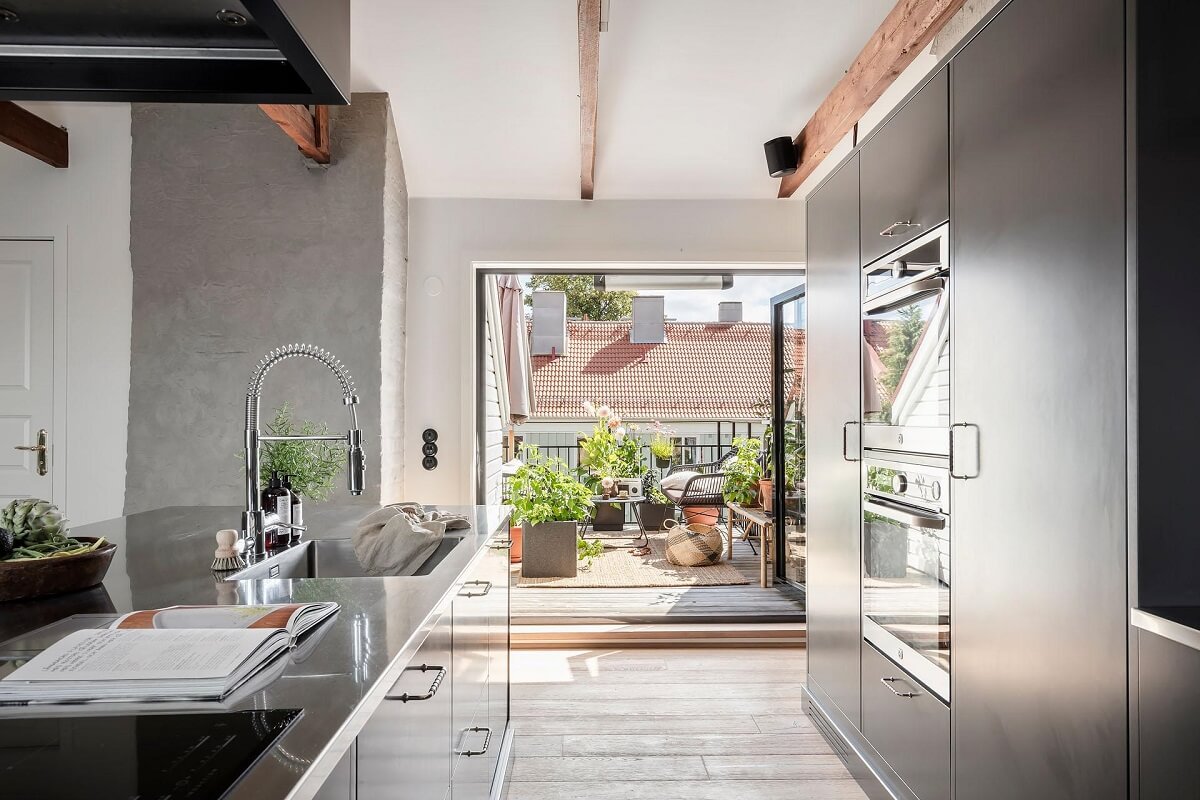 A Swedish Maisonette with Warm Pink Living Room 5 stainless-steel-kitchen-roof-terrace-maisonette-home-nordroom