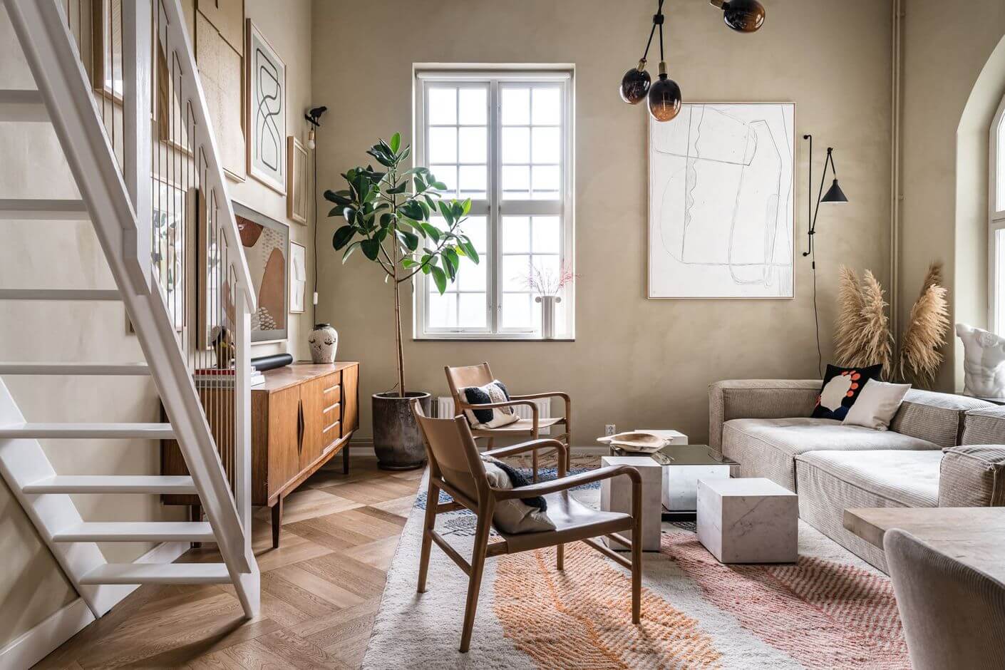 A Historic Factory Transformed Into A Stylish Home 4 stylish-nordic-living-room-beige-walls-nordroom