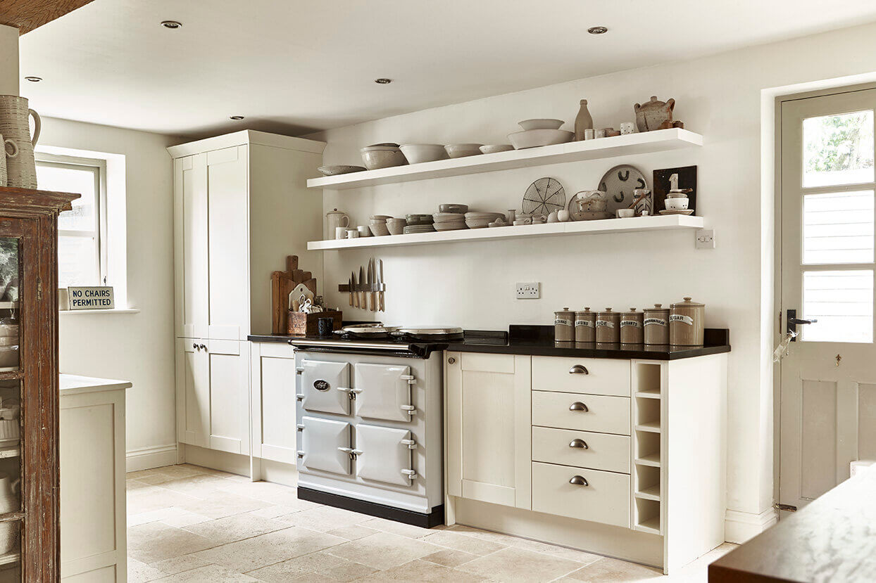 The Dairy House: A Serene Cottage in England 5 the-dairy-house-hampshire-kitchen-stove-peagreen-locations