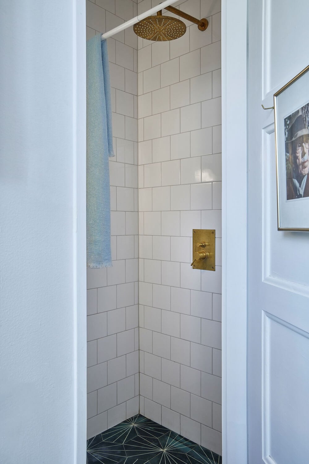 A Split-Level Attic Apartment with Blue Bedroom 17 tiny-bathroom-brass-fittings-green-tile-floor-nordroom