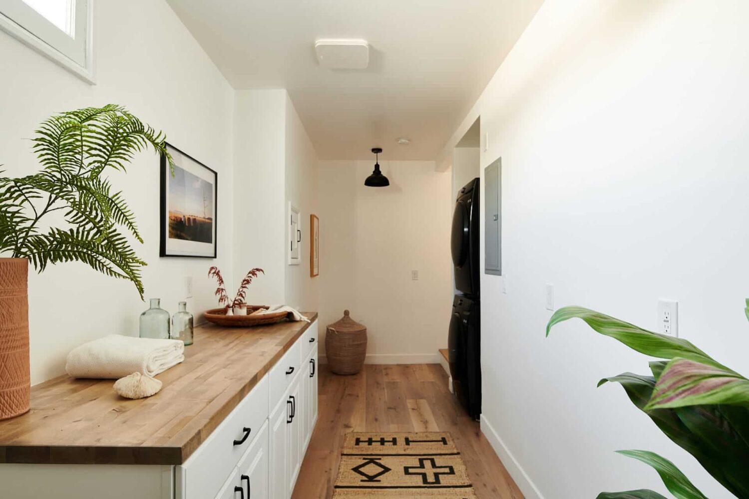 Warm Neutrals in a Lovely Home in Silver Lake, Los Angeles 22 utility-room-black-washer-dryer-nordroom