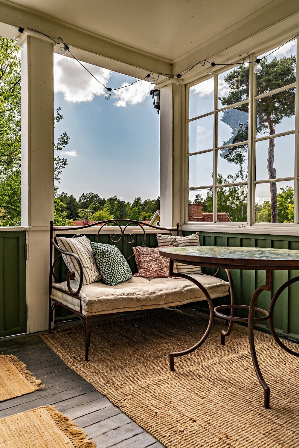 Bold Colors in a 1920s Villa in Sweden 28 veranda-jute-rug-nordroom