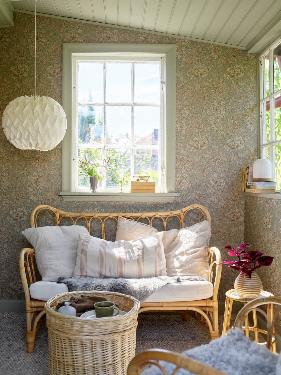 A Cozy Renovated Cottage on a Swedish Allotment 16 wallpaper-rattan-furniture-nordroom