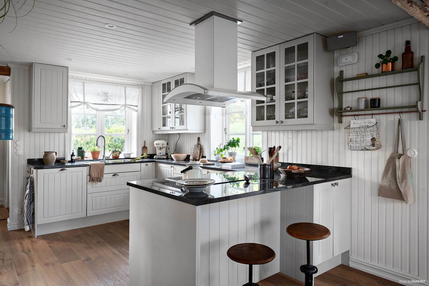 A Charming Swedish Villa Filled with Wallpaper 7 white-country-kitchen-breakfast-bar-nordroom