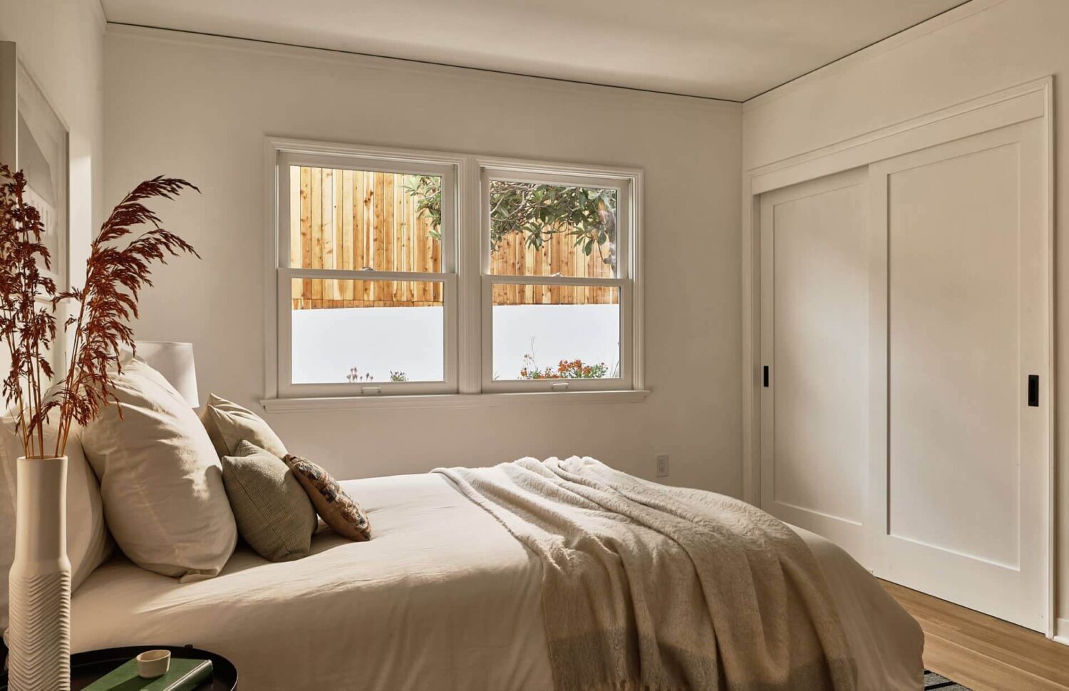 Warm Neutrals in a Lovely Home in Silver Lake, Los Angeles 18 white-guest-bedroom-built-in-wardrobes-nordroom