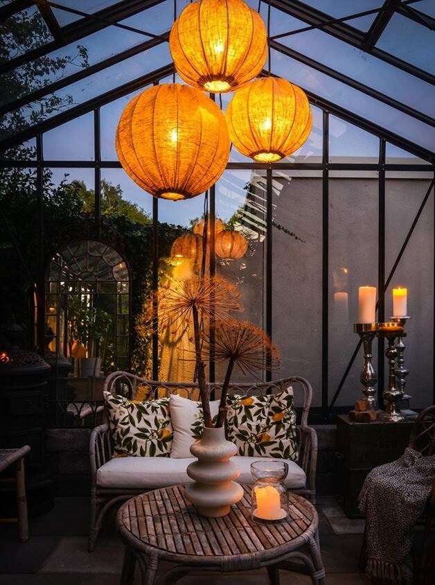 A Swedish 1930s Villa Decorated in Gray and Green Tones 22 winter-garden-at-night-nordroom