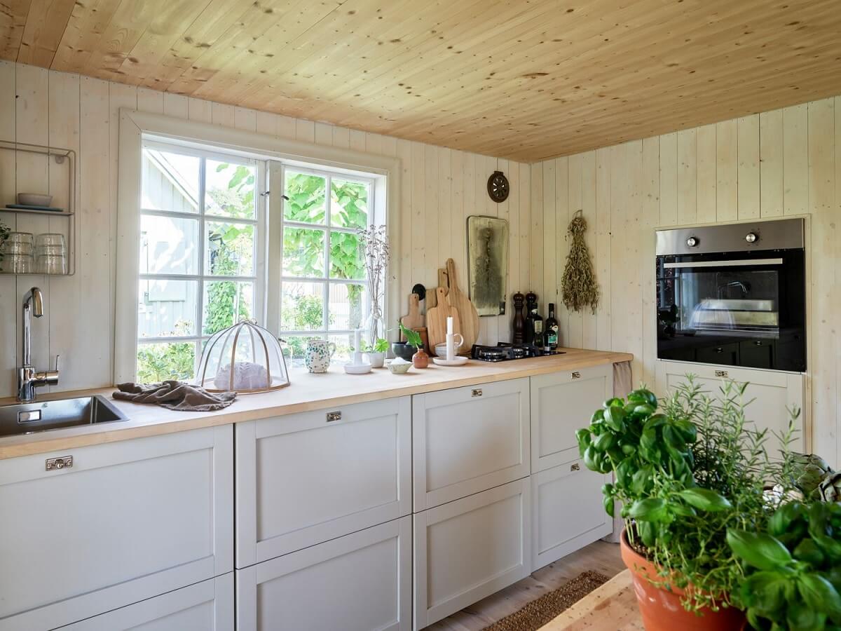 A Cozy Renovated Cottage on a Swedish Allotment 2 wooden-kitchen-swedish-cottage-nordroom