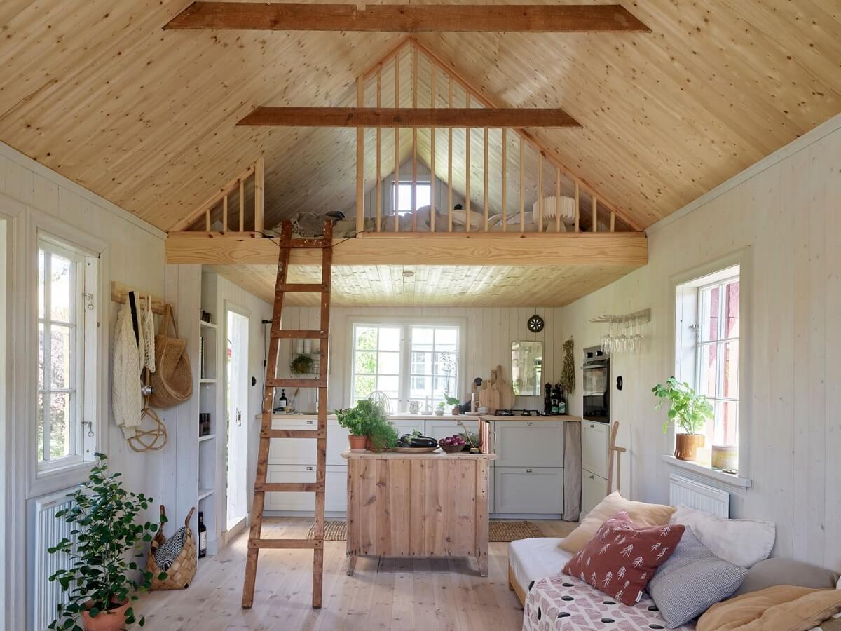 A Cozy Renovated Cottage on a Swedish Allotment 1 wooden-swedish-summerhouse-loft-bedroom-nordroom