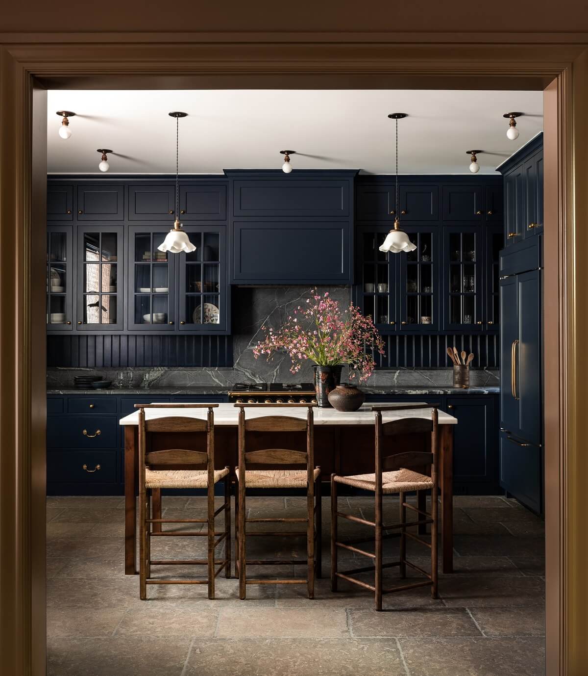 A Lesson in Color and Pattern in a San Francisco Home 9 Heidi-Caillier-Design-Cow-Hollow-SF-interior-design-dark-kitchen-reclaimed-limestone-floors