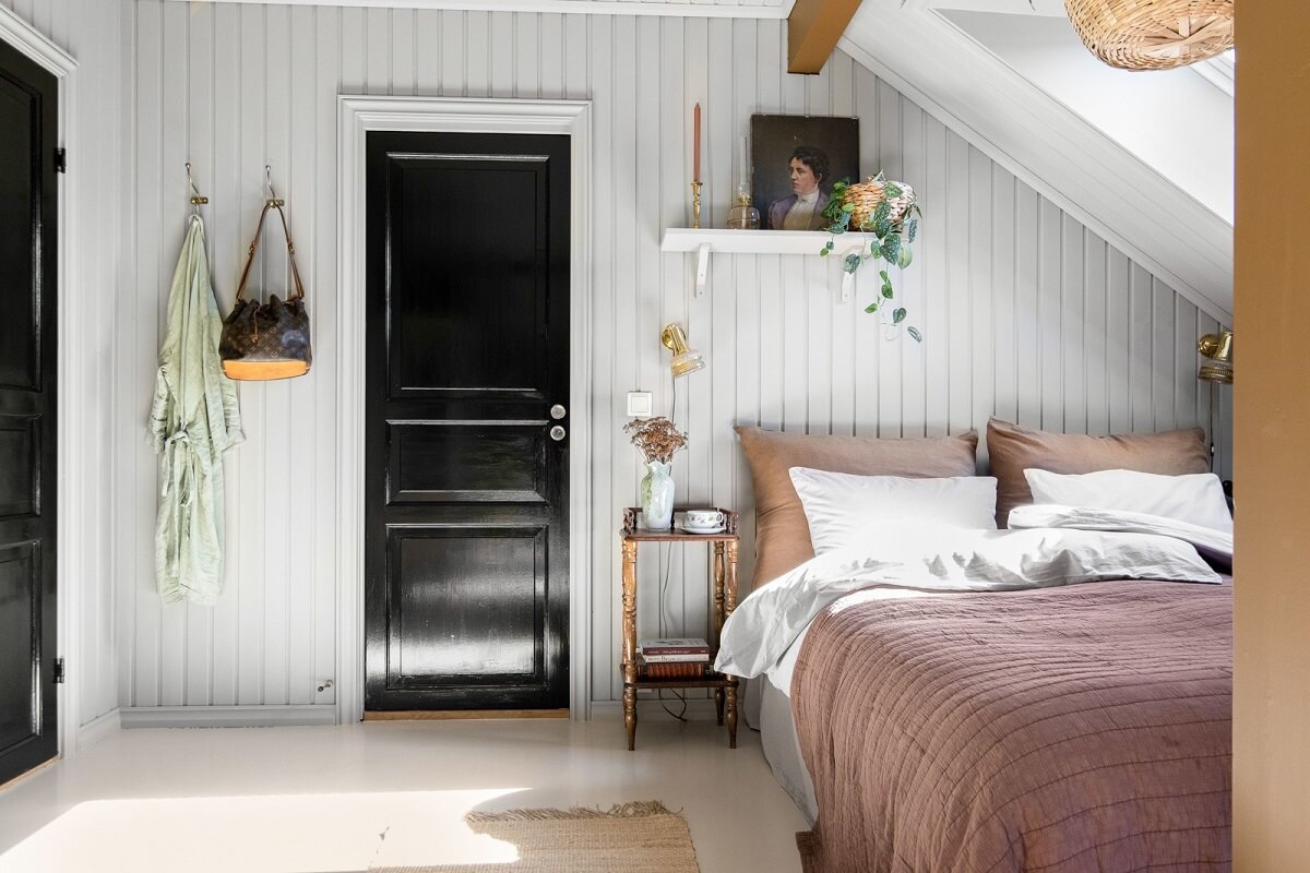 A Charming Attic Apartment Decorated with Color 27 attic-bedroom-soft-pink-details-nordroom